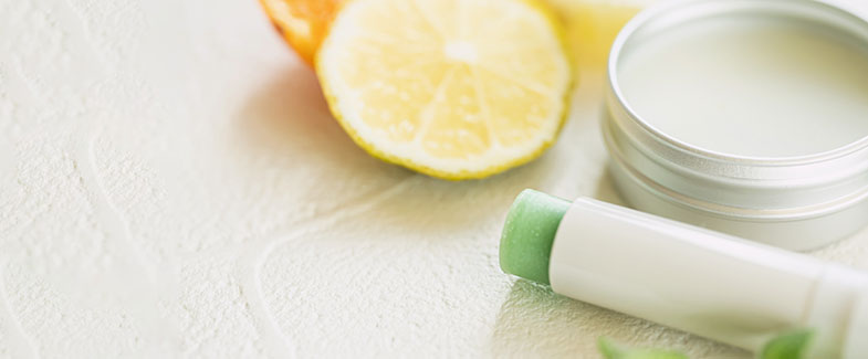 Lemon with lip balm tube