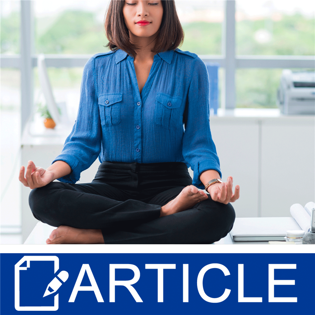 A woman sitting on an office desk meditating