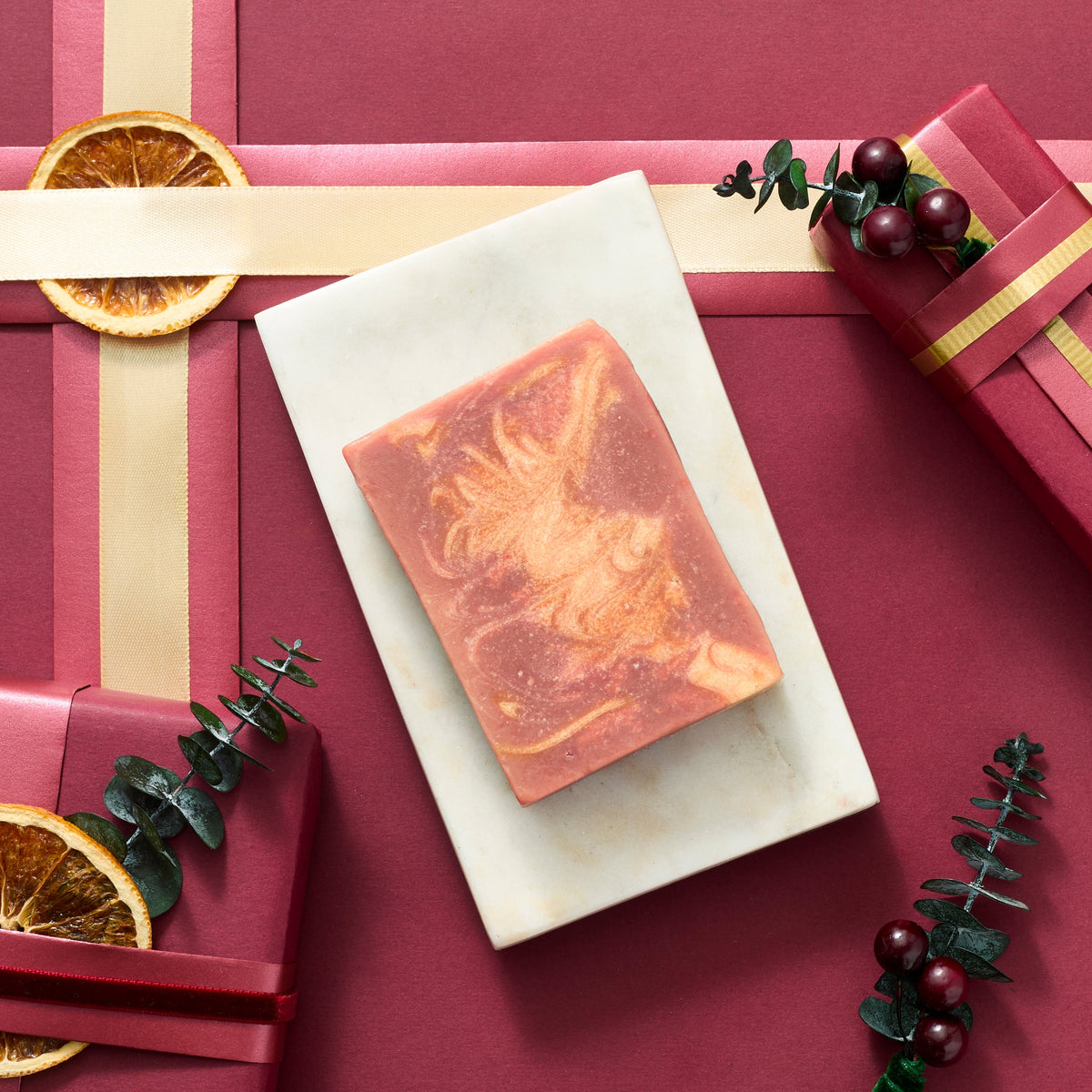 cranberry orange CP soap on holiday background