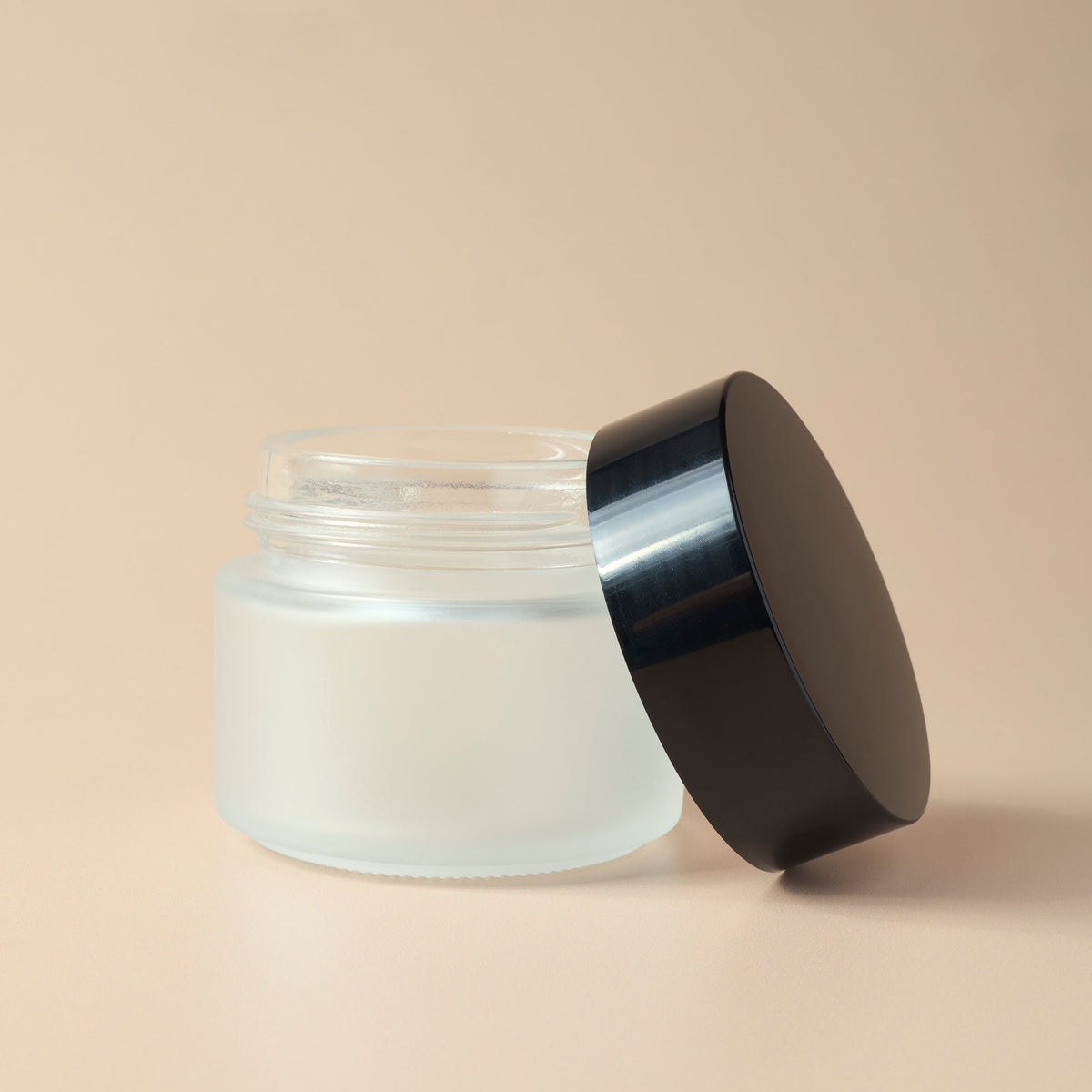3.38 oz Frosted Glass Jar & Black Lid