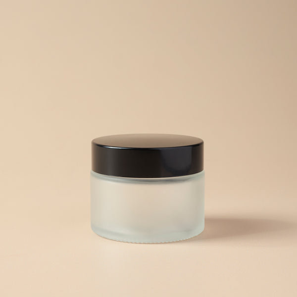 1.69 oz Frosted Glass Jar & Black Lid - close-up