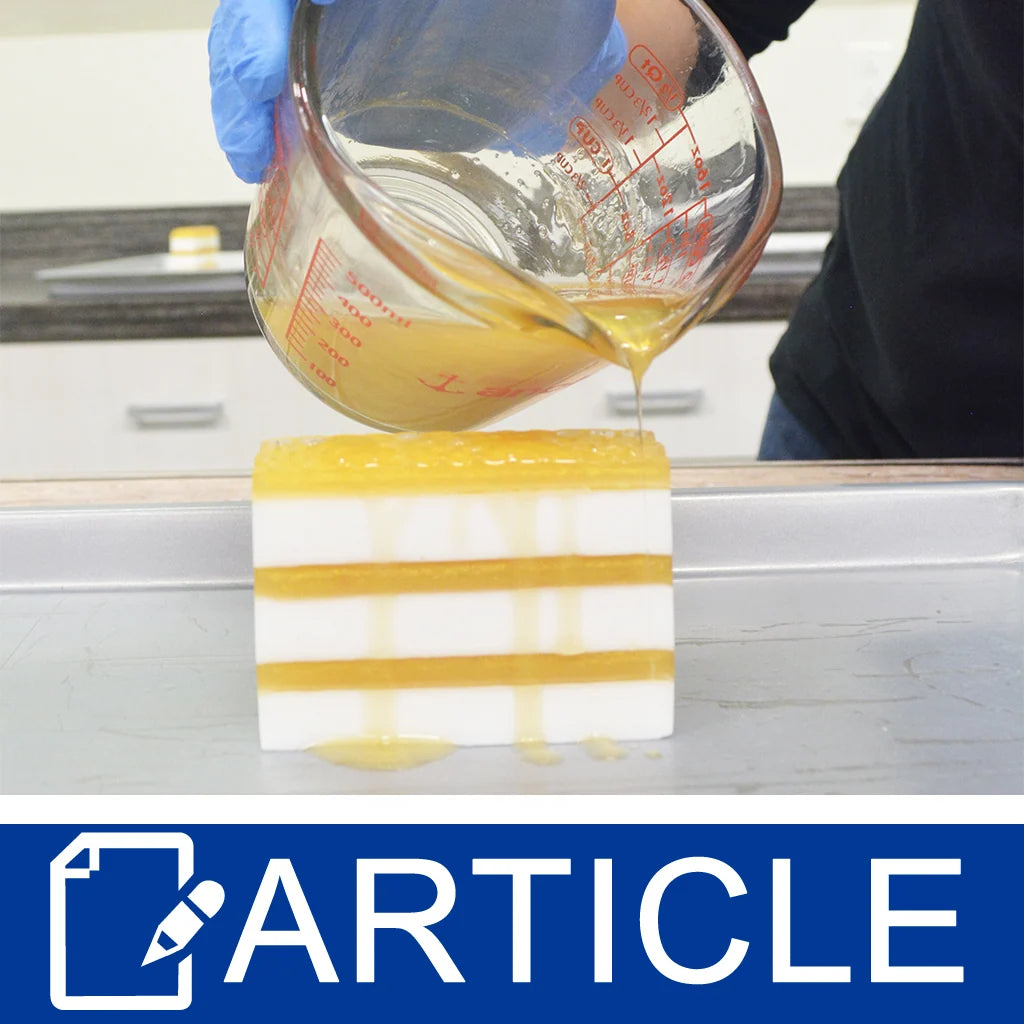 Yellow and white striped soap with a person pouring yellow soap on top of it 